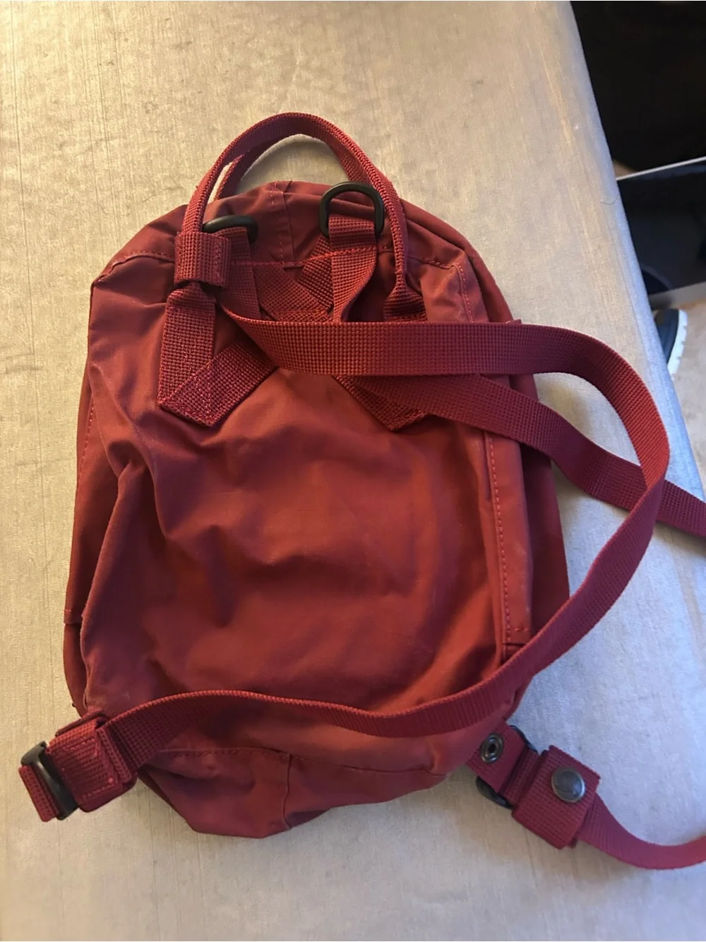 Fjallraven Kånken Mini Backpack in deep burgundy red